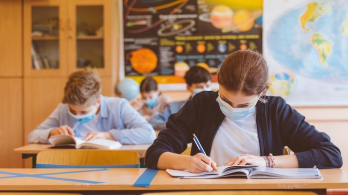 High school students at school, wearing N95 Face masks.